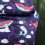 A close up of the sleeping whales design on the Integra ocean slumber baby carrier available at Babipur.
