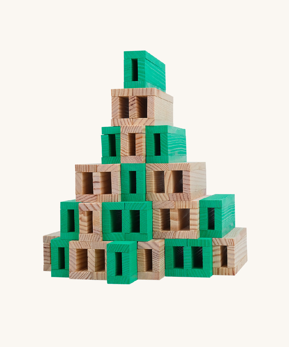 The Kapla 40 Square wooden engineering blocks set - stacked to create a pyramid structure.