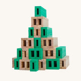 The Kapla 40 Square wooden engineering blocks set - stacked to create a pyramid structure.