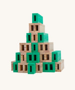 The Kapla 40 Square wooden engineering blocks set - stacked to create a pyramid structure.