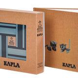 Kapla plastic-free wooden building blocks and book set stood up on a white background