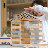 A build created using natural and grey coloured Kapla wooden planks.