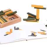 Kapla plastic free wooden stacking shape set spread out on a white background showing the inside of the instruction booklet