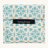 Keep Leaf large baggie in geo design. A cream colour organic cotton pouch for food with light blue geo shapes printed all over. Features a velcro lid for easy fastening