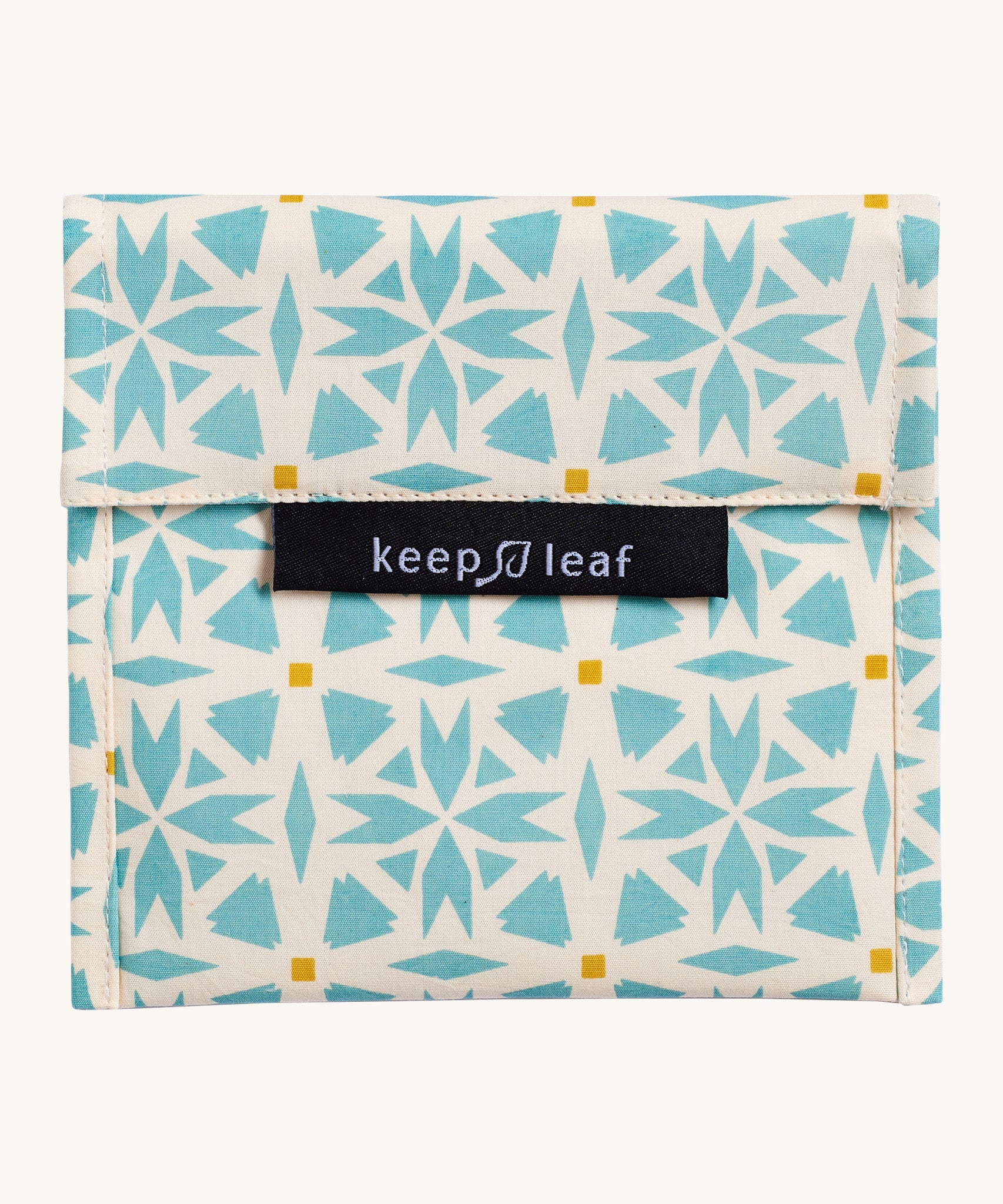 Keep Leaf large baggie in geo design. A cream colour organic cotton pouch for food with light blue geo shapes printed all over. Features a velcro lid for easy fastening