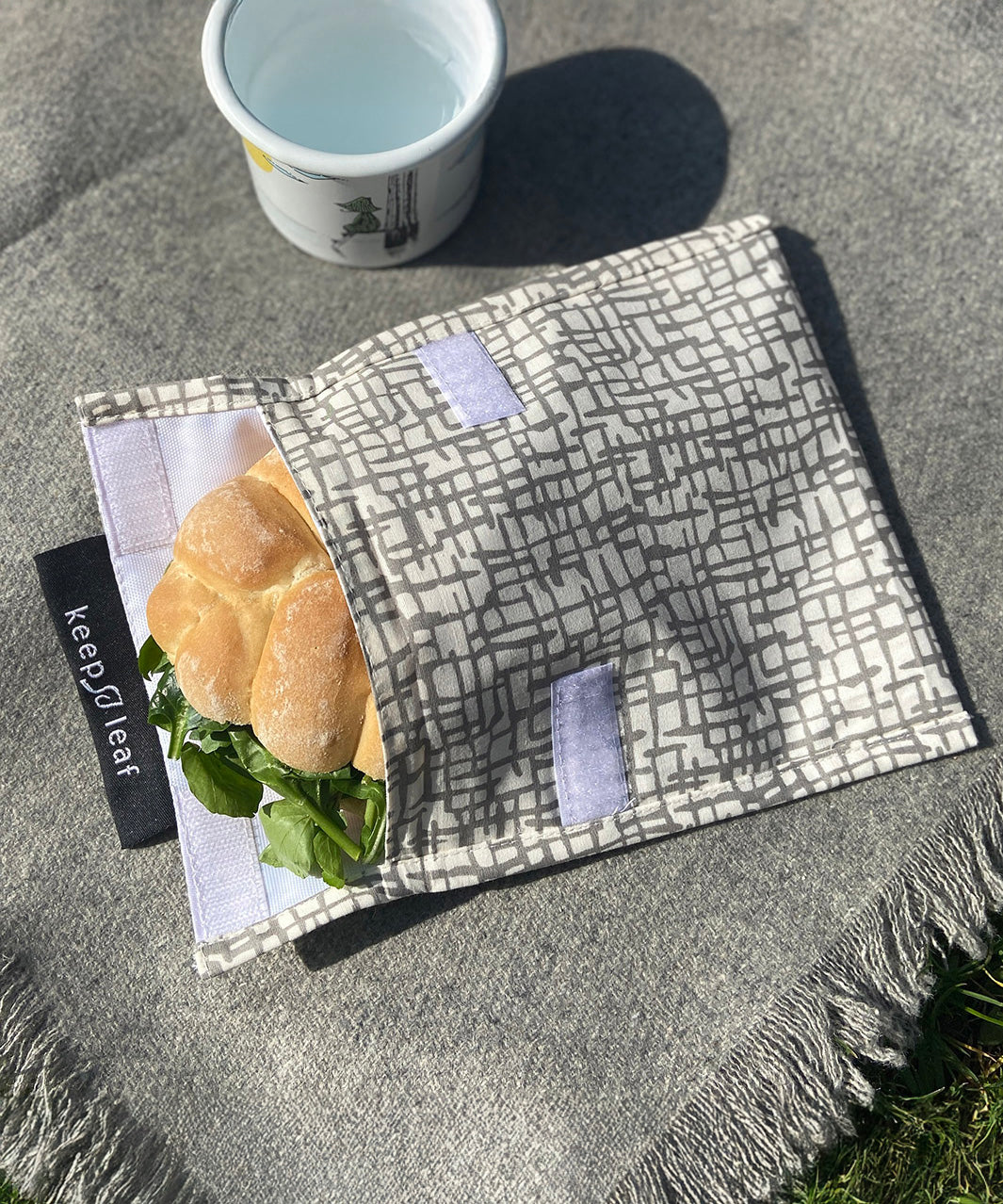 Keep Leaf large baggie in mesh design outside on a blanket with a sandwich inside the pouch for size reference