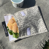 Keep Leaf large baggie in mesh design outside on a blanket with a sandwich inside the pouch for size reference