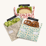 Keep Leaf large baggie in geo new fruit and mesh design. A cream colour organic cotton pouch for food with food inside for size reference