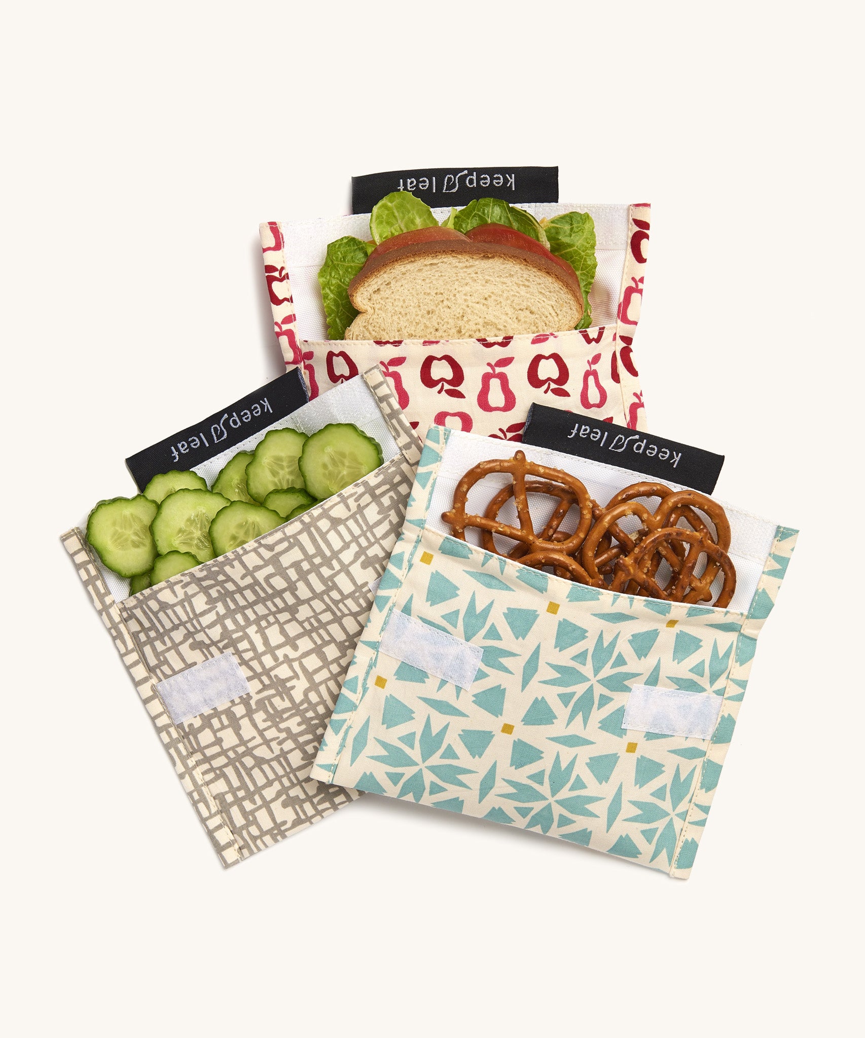 Keep Leaf large baggie in geo new fruit and mesh design. A cream colour organic cotton pouch for food with food inside for size reference