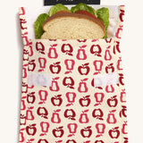 Keep Leaf large baggie in new fruit design. A cream colour organic cotton pouch for food with red apples and pears outline printed all over. Features a velcro lid for easy fastening and a sandwich inside for size reference