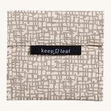 Keep Leaf large baggie in mesh design. A cream colour organic cotton pouch for food with grey mesh lines printed all over. Features a velcro lid for easy fastening
