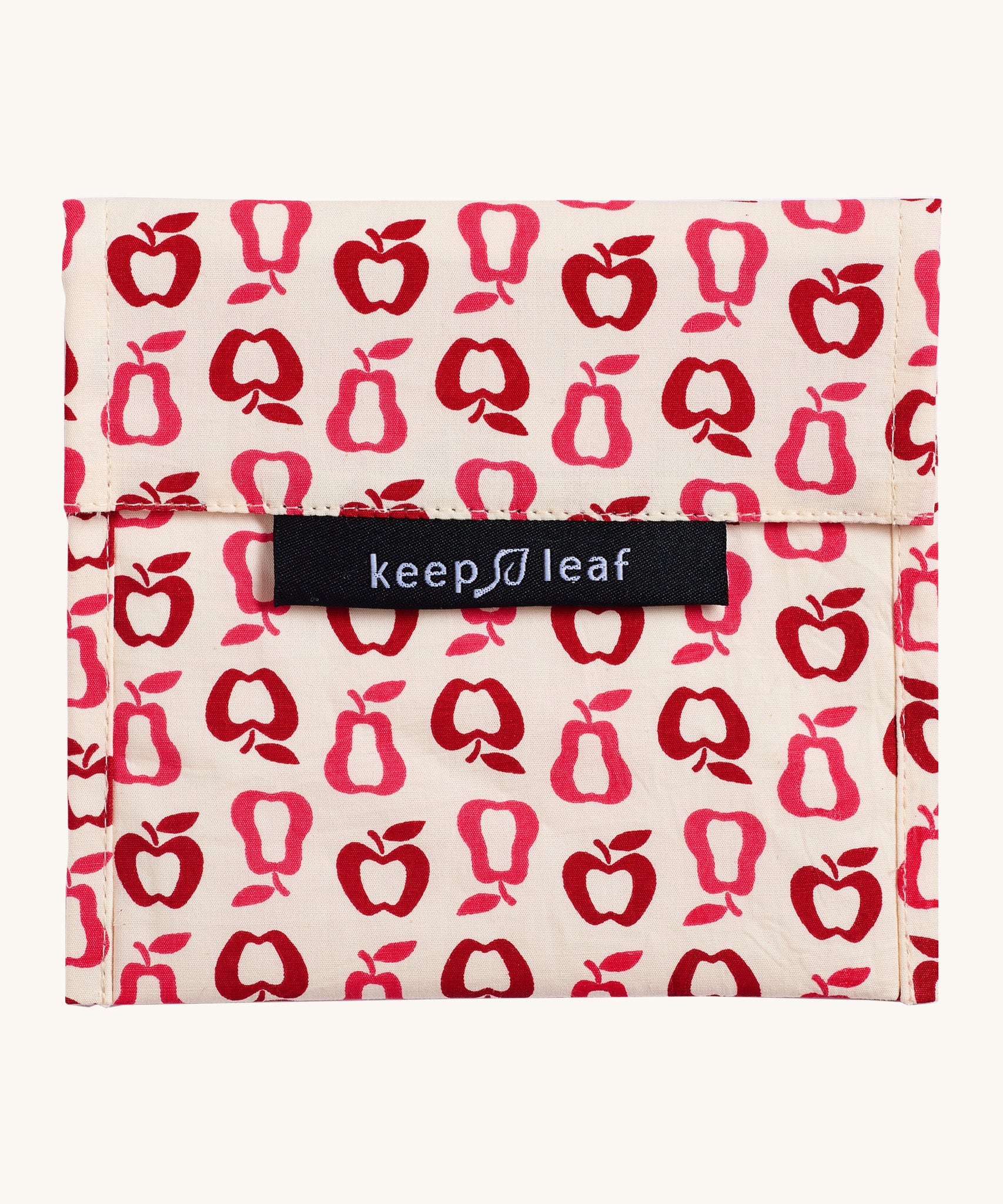 Keep Leaf large baggie in new fruit design. A cream colour organic cotton pouch for food with red apples and pears outlines printed all over. Features a velcro lid for easy fastening