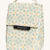 Keep Leaf insulated lunchbag in geo design. A cream colour organic cotton bag  with light blue geo shapes printed all over. Features a handle for carrying and a velcro lid.