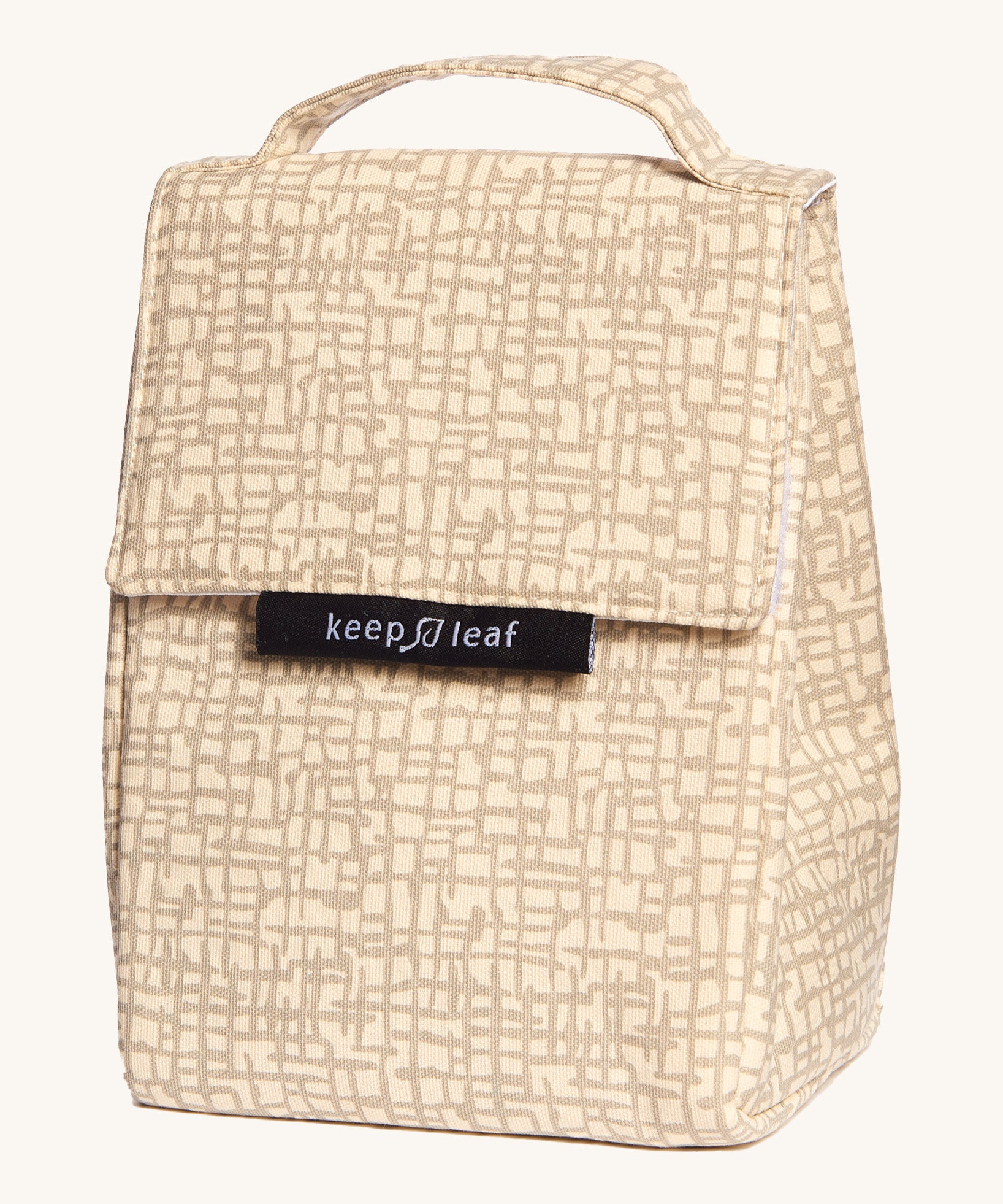 Keep Leaf insulated lunchbag in mesh design. A cream colour organic cotton bag  with grey abstract mesh lines printed all over. Features a handle for carrying and a velcro lid.