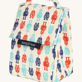 Keep Leaf insulated lunchbag in robot design. A cream colour organic cotton bag  with red and blue robots printed all over. Features a handle for carrying and a velcro lid.