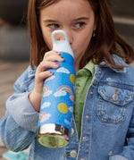 A child drinking from a Rainbow print Kid Kanteen 12oz Insulated Flip Seal Sport Cap Bottle.