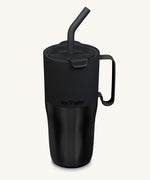 Klean Kanteen 26oz black rise insulated stainless steel tumbler available at Babipur. A black tumbler with a mat finish on the top half and glossy finish on the bottom half. Features a matching flip lid a handle on the side and matching straw.
