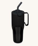 Klean Kanteen 36oz black rise insulated stainless steel tumbler available at Babipur. A black tumbler with a mat finish on the top half and glossy finish on the bottom half. Features a matching flip lid a handle on the side and matching straw.