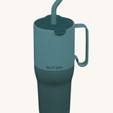 Klean Kanteen 36oz Brittany blue rise insulated stainless steel tumbler available at Babipur. A light and dark blue tumbler with a matching flip lid. Features a handle on the side and matching straw.