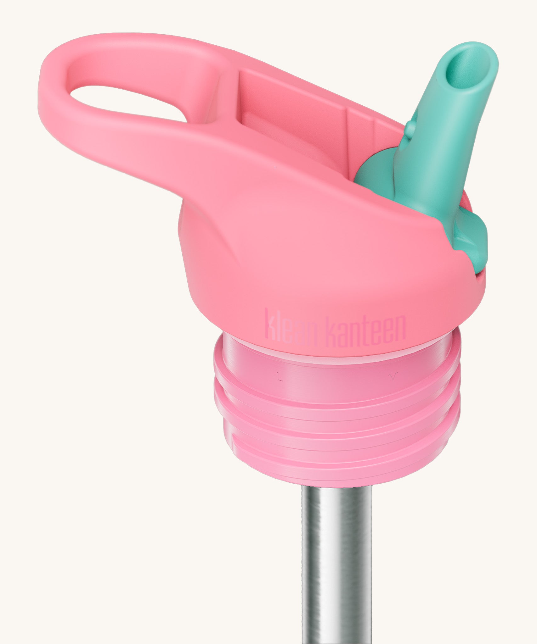 A close up of the Klean Kanteen pink and turquoise flip sports straw cap for the rise insulated bottle showing the turquoise spout and small loop detail.