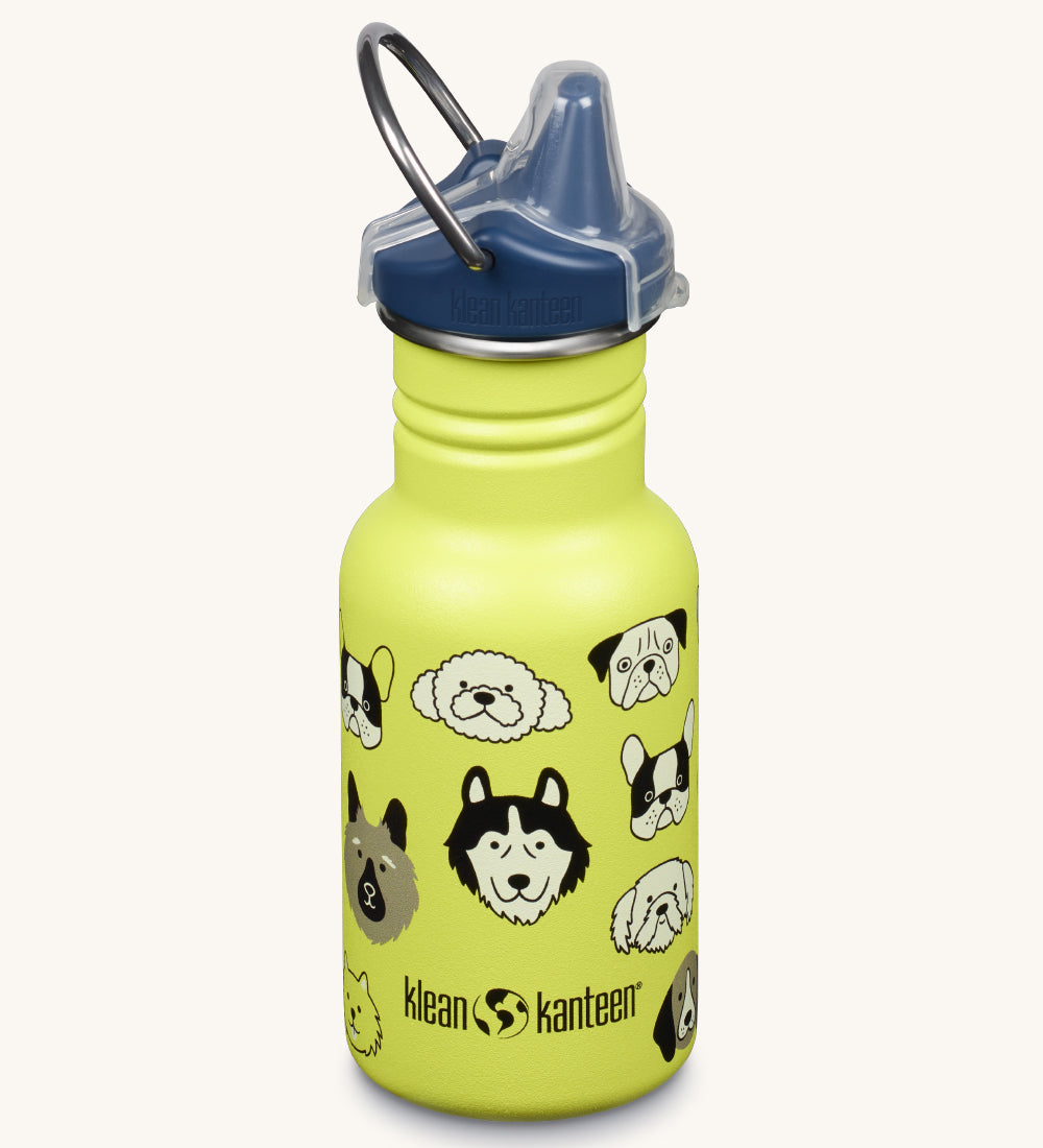 A Kid Kanteen 12oz Narrow Sippy reusable stainless steel water Bottle. The bottle is lime green with a monochrome coloured dog print, the sippy lid is navy blue.