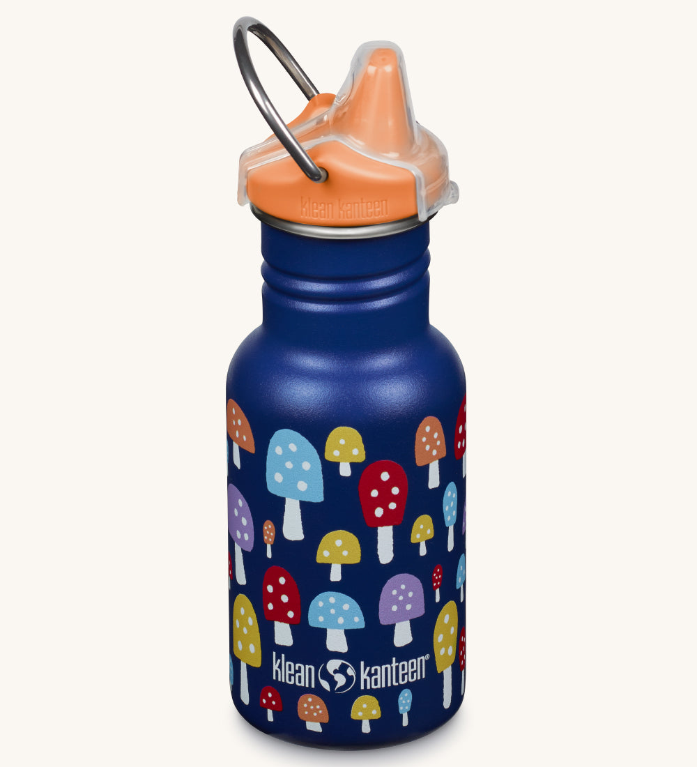 A Kid Kanteen 12oz Narrow Sippy reusable stainless steel water Bottle. The bottle is blue with a multi coloured mushroom print, the sippy lid is orange.