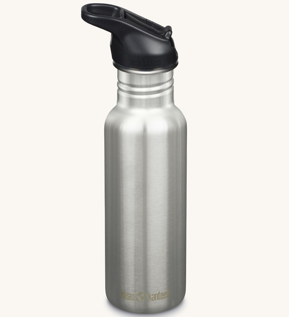 A Klean Kanteen 18oz Classic Narrow Leakproof Flip Seal Sports Cap Reusable Stainless Steel Water Bottle in brushed steel with a black coloured lid.