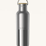 Klean Kanteen 20oz reusable stainless steel reflect water bottle available at Babipur with a smooth top half finish and a glossy bottom half finish. Features a handy loop cap with a bamboo top.