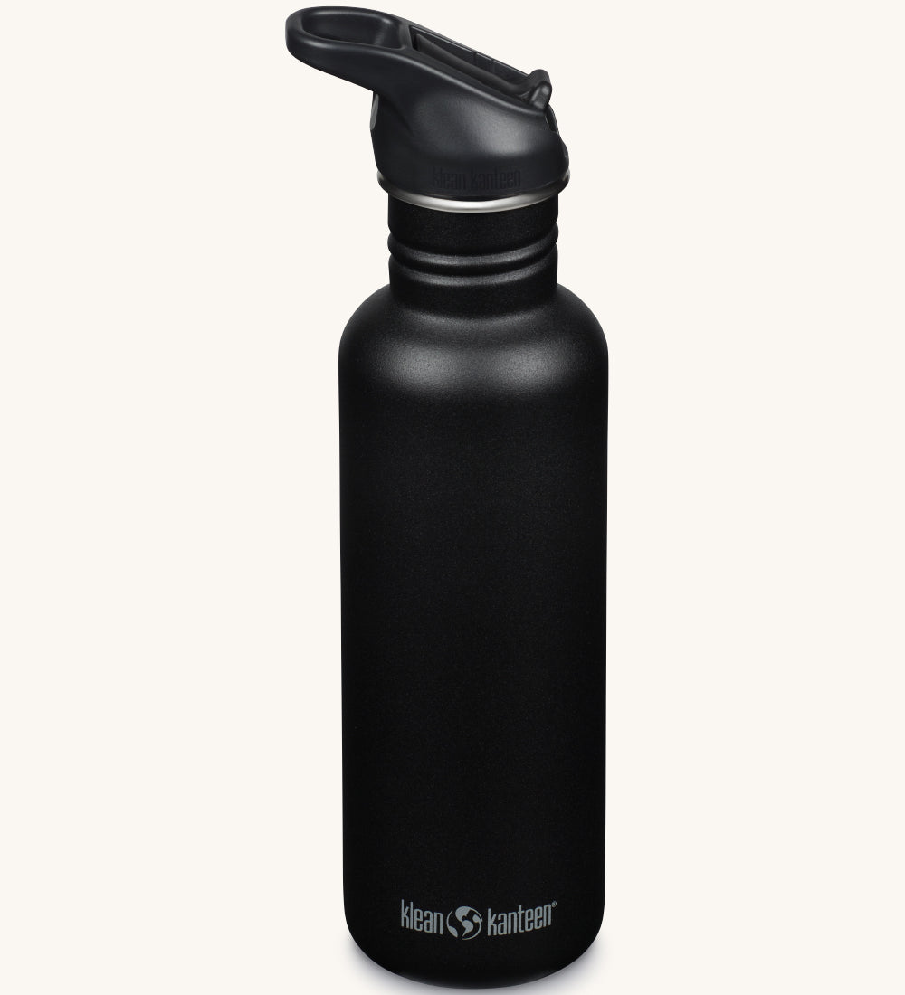 A black coloured Klean Kanteen 27oz Classic Narrow Flip Seal Sports Cap Reusable Stainless Steel Water Bottle.
