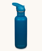 A Corsair blue coloured Klean Kanteen 27oz Classic Narrow Flip Seal Sports Cap Reusable Stainless Steel Water Bottle.
