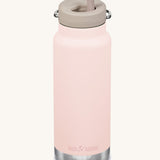 A Klean Kanteen 32oz peach parfait pink coloured TKWide with taupe coloured Twist Straw Cap on a plain background.