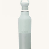 A Klean Kanteen 20oz rise insulated Reusable Stainless Steel Water Bottle in a barely blue colour that's split in a light and dark shade. Features a matching loop cap with a thread and handle for easy carrying