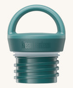 A close up of the Klean Kanteen Brittany blue loop cap that fits on the 20oz classic rise bottle available at Babipur showing the thread and loop hand detail