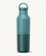 A Klean Kanteen 20oz rise insulated Reusable Stainless Steel Water Bottle with loop cap in a Brittany blue colour available at Babipur that's split in a light and dark shade. Features a matching loop cap