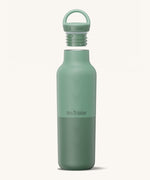 A Klean Kanteen 20oz rise insulated Reusable Stainless Steel Water Bottle in a iceberg colour that's split in a light and dark shade. Features a matching loop cap with a thread and handle for easy carrying