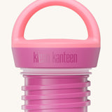 A close up of the Klean Kanteen pink lemonade loop cap that fits on the 20oz classic rise bottle available at Babipur showing the thread and loop hand detail