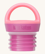 A close up of the Klean Kanteen pink lemonade loop cap that fits on the 20oz classic rise bottle available at Babipur showing the thread and loop hand detail