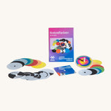 Kraul spinning top colour kit showing a wooden spinning top and different coloured disks with notches to create different visual effects