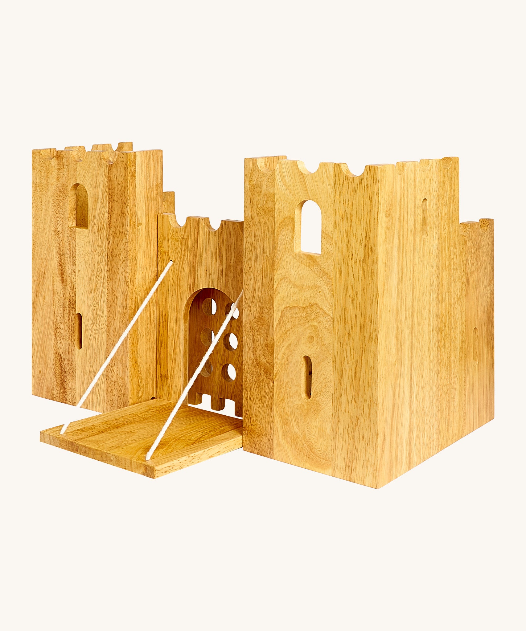 Side view of the  wooden Lanka Kade castle showing the corner walls with window holes, the lowered drawbridge and the gate closed