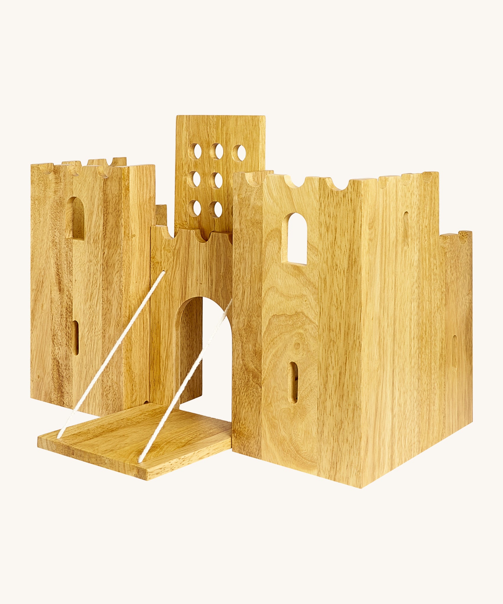 Side view of the  wooden Lanka Kade castle showing the corner walls with window holes, the lowered drawbridge and the gate lifted
