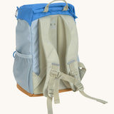 The back of the Lassig kids mini outdoor backpack in sunny explorer green showing the padded shoulders and mesh side pocket detail.