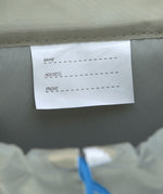 A close up of the name tag on the Lassig kids mini outdoor backpack.