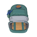The Lassig mini backpack for kids in a dark green colour, with the bottom zippered compartment open to show how you can store a lunch box inside and secure it with the built in straps.