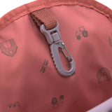 The inside of the Lassig mini kids backpack, showing a handy hook inside the bag.