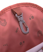 The inside of the Lassig mini kids backpack, showing a handy hook inside the bag.