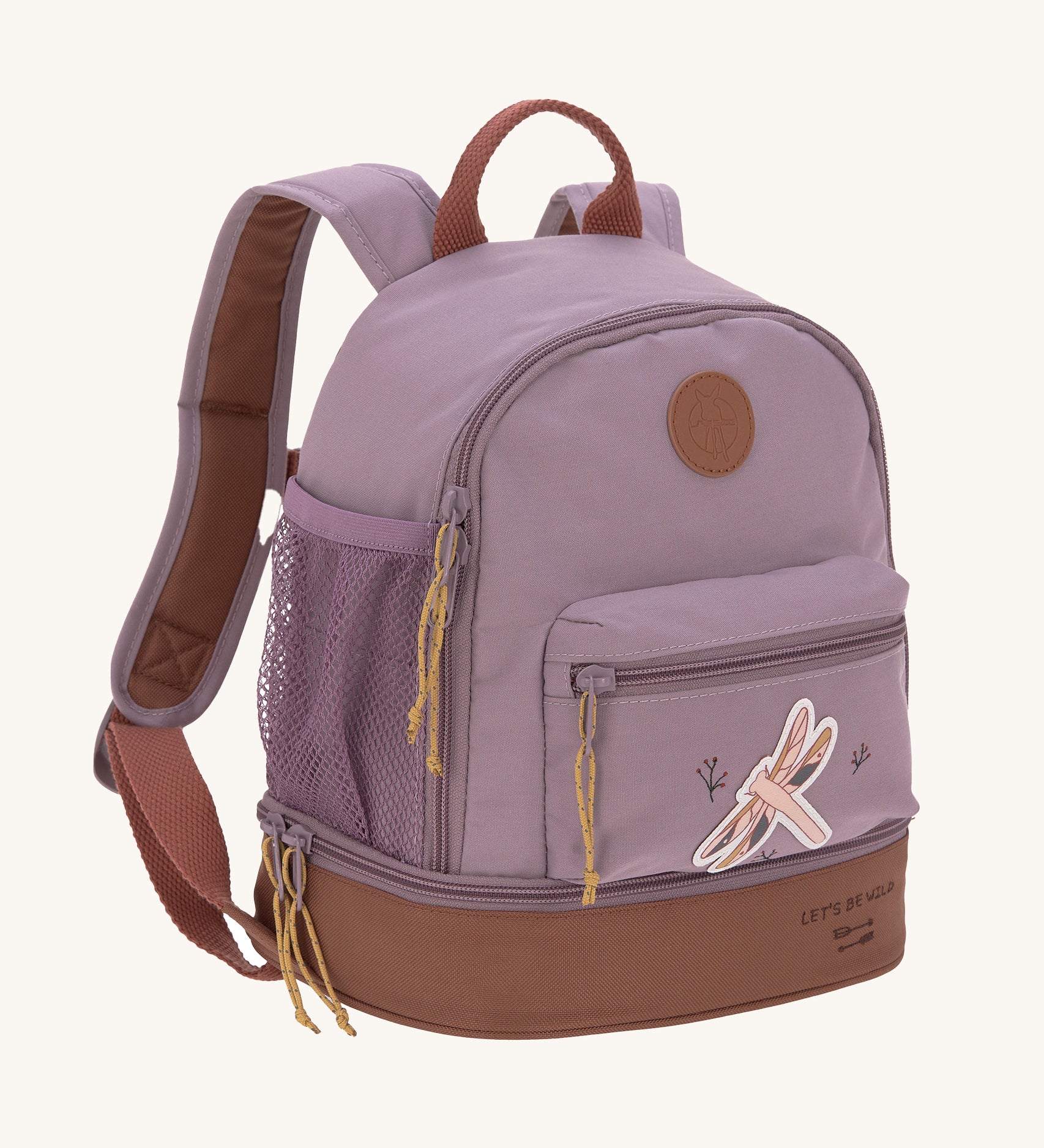 The Lassig kids mini adventure backpack in a mauve pink with a brown base, and a little dragonfly design on the front zip pocket.