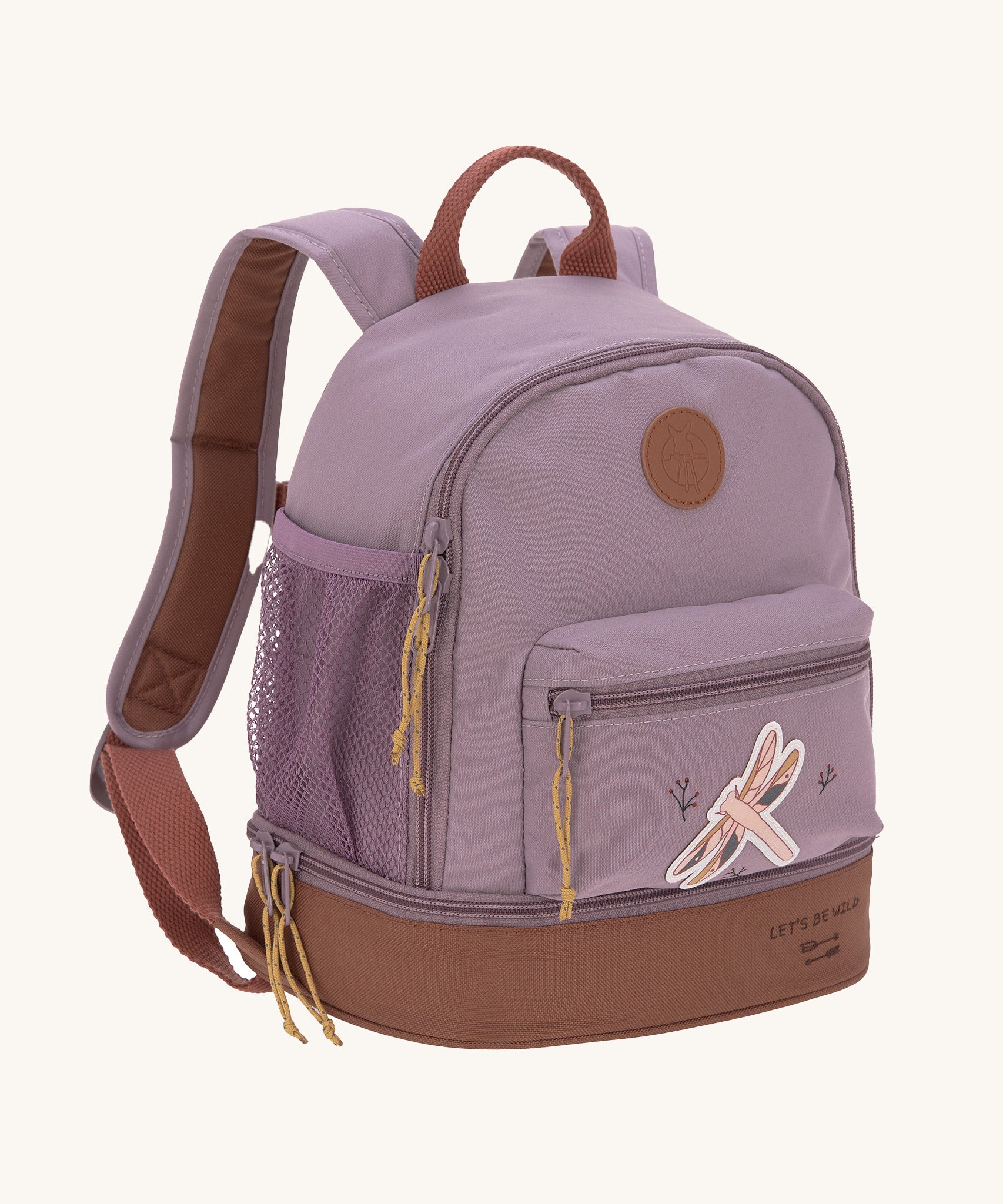 The Lassig kids mini adventure backpack in a mauve pink with a brown base, and a little dragonfly design on the front zip pocket.