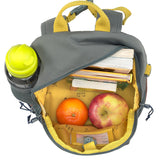 A top view of the Lassig mini kids campervan backpack, showcasing the vast storage space inside and the yellow campervan print.