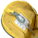 The inside of the Lassig kids mini adventure backpack, with a handy hook to keep keys attached safe.