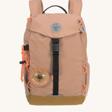 The Lassig kids mini outdoor backpack in a hazelnut light brown colour, with black adjustable straps and removable, customisable patches.